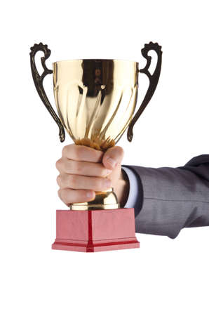 Man being awarded with golden cupの写真素材