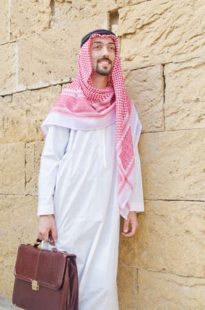 Arab on the street in summerの写真素材