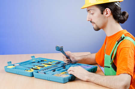 Repairman with his toolkit