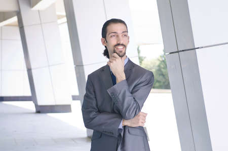 Young businessman on the streetの写真素材