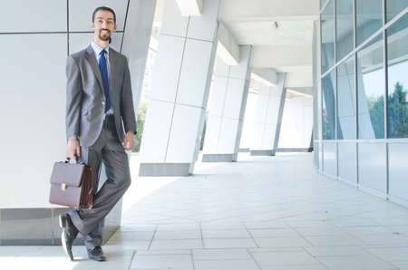 Young businessman on the streetの写真素材