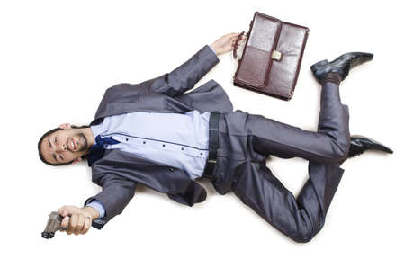 Dead businessman on the floorの写真素材