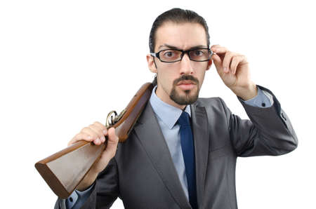 Businessman with gun isolated on white