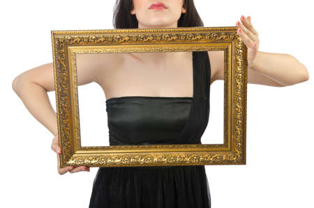 Woman with picture frame on whiteの写真素材