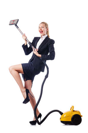 Woman cleaning with vacuum cleanerの写真素材
