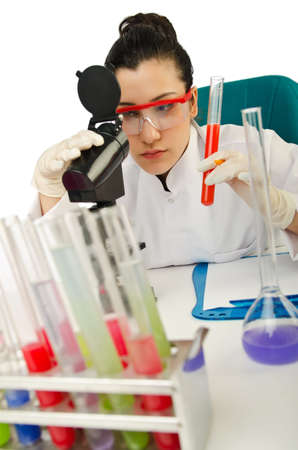 Female chemist in studio on whiteの写真素材
