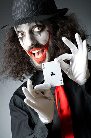 Joker with cards in studio shoot