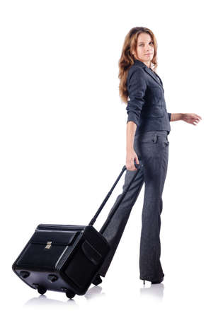 Businesswoman with suitcase on whiteの写真素材