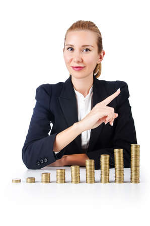 Businesswoman with coins on whiteの写真素材