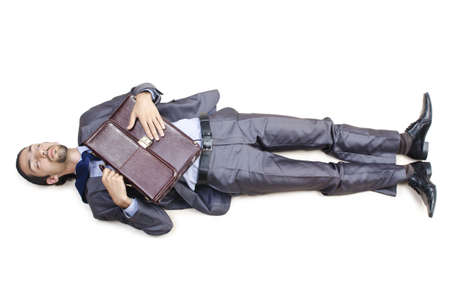 Dead businessman on the floorの写真素材