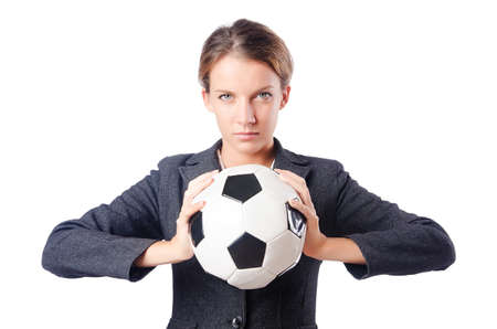 Businesswoman with football on whiteの写真素材