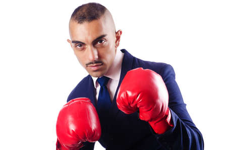 Handsome businessman with boxing glovesの写真素材