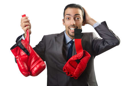 Handsome businessman with boxing glovesの写真素材