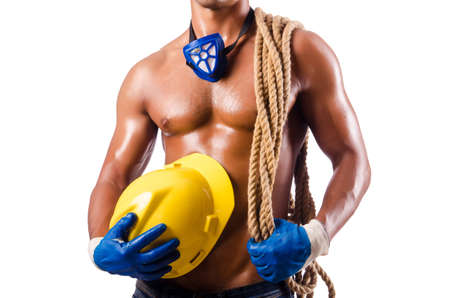 Muscular builder with tools isolated on whiteの写真素材