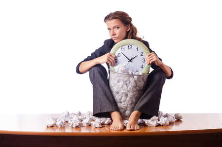 Woman with lots of discarded paperの写真素材
