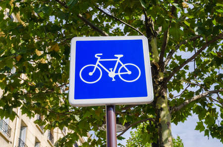 Bicycle sign on blue backgroundの写真素材