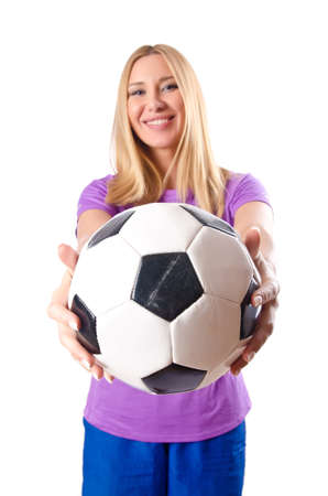 Woman playing football on whiteの写真素材