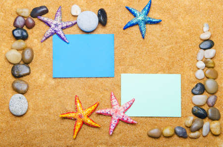 Blank message on sand and pebblesの写真素材