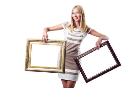 Woman with picture frame on white