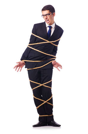 Businessman tied up with rope on whiteの写真素材