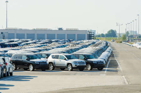 TUSCANY, ITALY - 27 June: New cars parked at distribution center in Tuscany, Italy. This one of biggest distribution centers in Italy.のeditorial素材