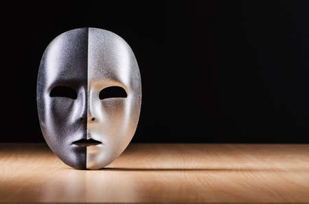 Mask against the dark backgroundの写真素材