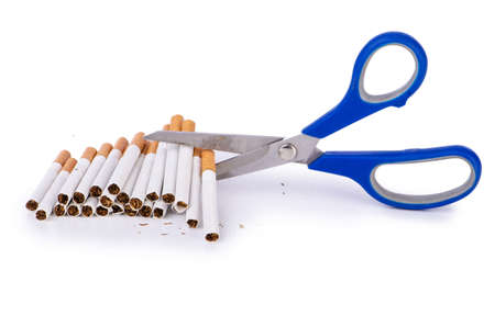 Antismoking concept with cigarettes and scissorsの写真素材