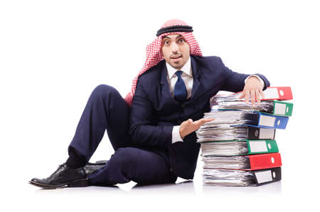 Arab businessman with many folders on whiteの写真素材