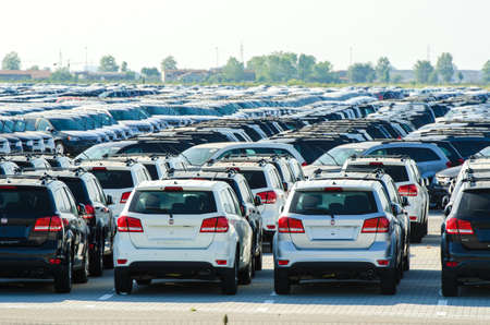 TUSCANY, ITALY - 27 June: New cars parked at distribution center in Tuscany, Italy. This one of...