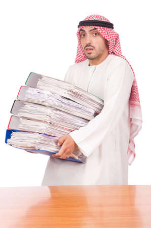 Arab businessman with many folders on whiteの写真素材
