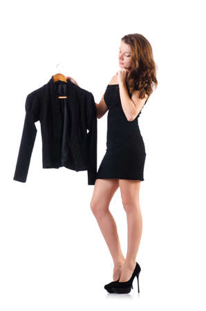 Young woman trying new clothing on whiteの写真素材