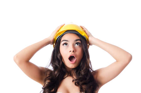 Young woman with hellow hard hat on whiteの写真素材