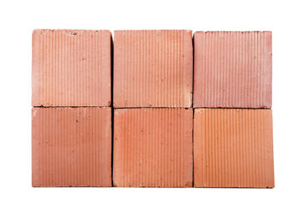Stack of clay bricks isolated on white