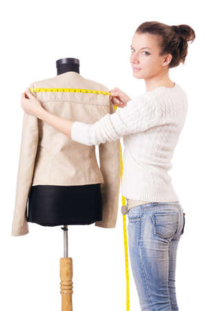 Woman tailor working on dress の写真素材