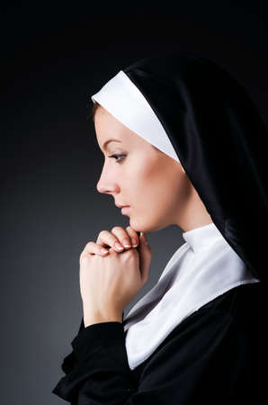 Young nun in religious conceptの写真素材