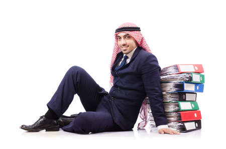 Arab businessman with many folders on whiteの写真素材