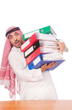 Arab businessman with many folders on whiteの写真素材