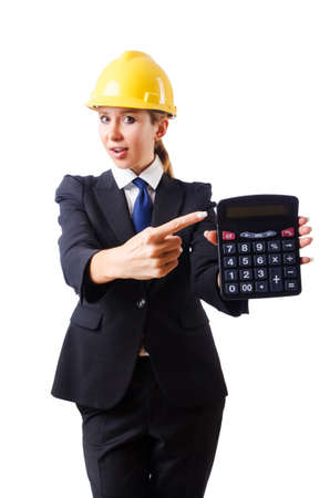 Female construction worker with calculatorの写真素材
