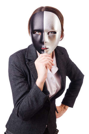 Woman with mask in hypocrisy conceptの写真素材