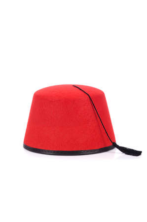 Red fez hat isolated on the whiteの写真素材