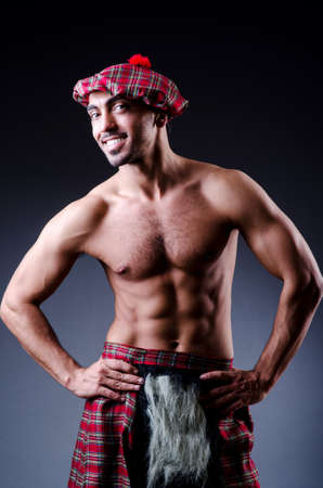Scottish traditions concept with person wearing kiltの写真素材