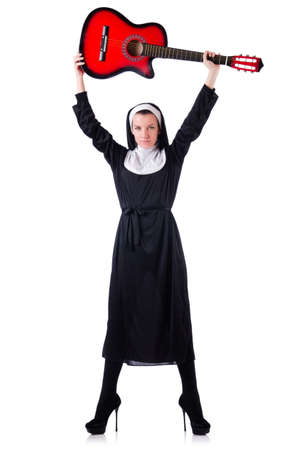 Nun playing guitar isolated on whiteの写真素材