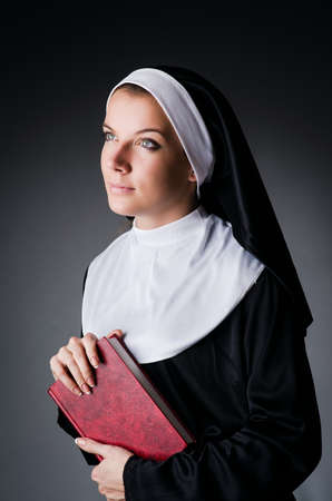 Young nun in religious conceptの写真素材