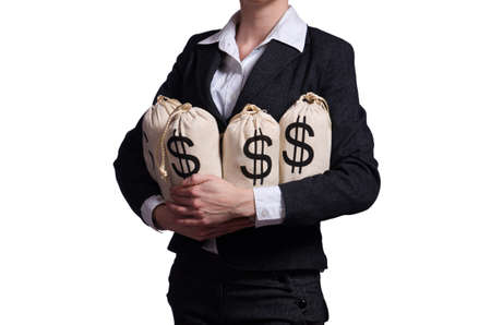 Woman with sacks of money on whiteの写真素材