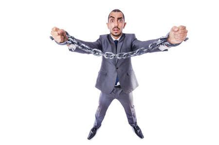 Businessman with handcuffs on whiteの写真素材
