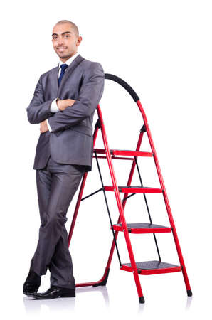 Businessman in career ladder conceptの写真素材