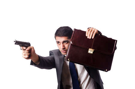 Businessman with gun isolated on whiteの写真素材