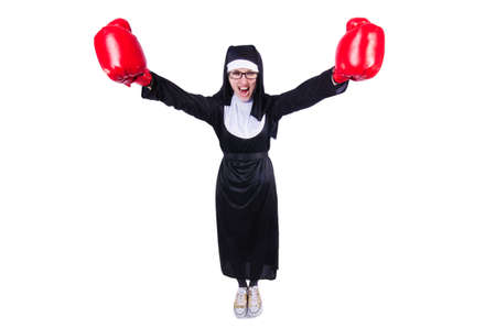 Nun with boxing gloves isolated on white
