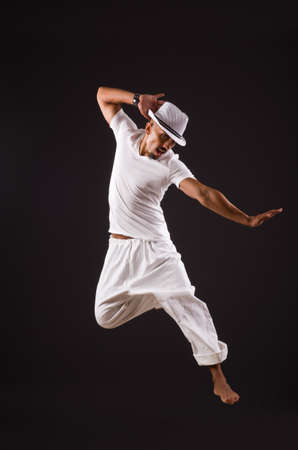 Dancer dancing in the dark studioの写真素材