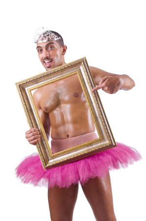 Man in pink tutu with picture frameの写真素材